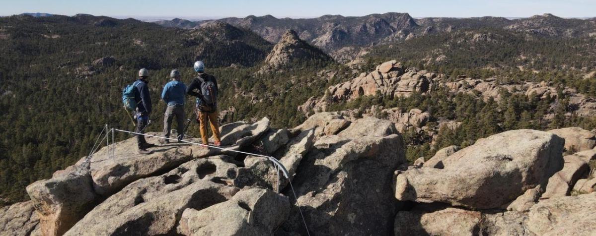 students at the top of the via ferrata at KMC